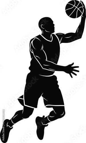 Silhouette of a basketball player dunking a ball