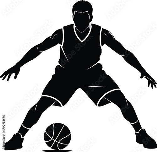 Silhouette of a basketball player dribbling the ball