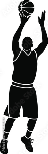 Silhouette of a basketball player shooting a ball