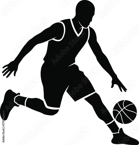 Silhouette of a basketball player dribbling the ball