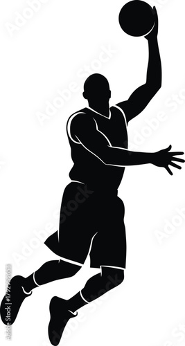 Silhouette of a basketball player jumping to dunk a basketball
