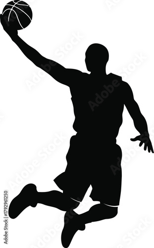 Silhouette of a basketball player dunking the ball