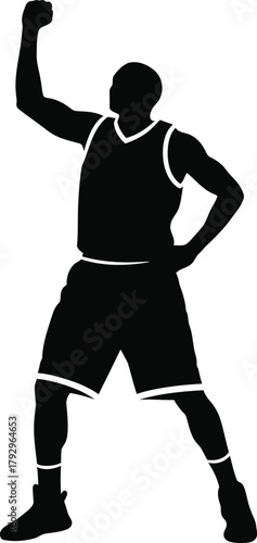 Silhouette of a basketball player celebrating a victory