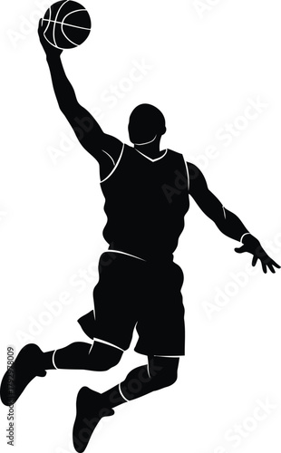 Silhouette of a basketball player dunking a ball