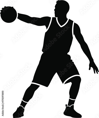 Silhouette of a basketball player holding a ball ready to shoot