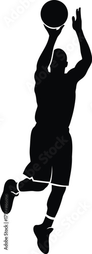 Silhouette of a basketball player shooting a jump shot