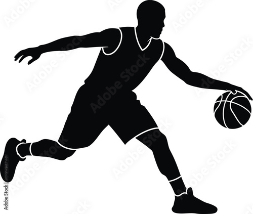 Silhouette of a basketball player dribbling the ball during a game