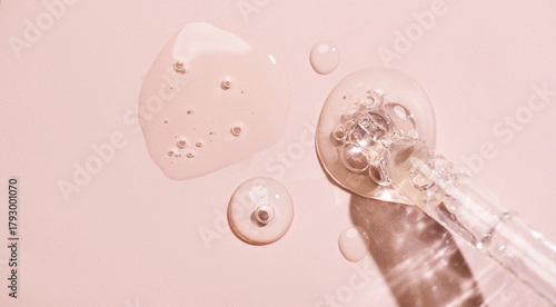 Foto Cosmetic dropper with serum, beauty cosmetics dripping, on pastel background