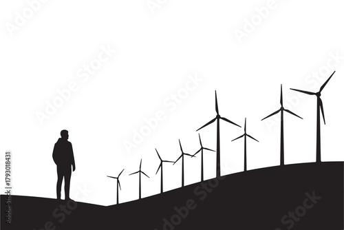 Silhouette of man observing wind turbines on a hill