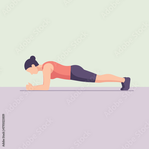 Woman Performing Plank Exercise for Core Strength and Fitness.