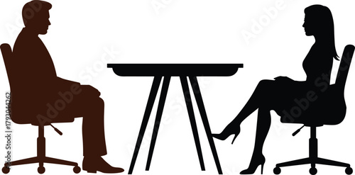 Job interview between a man and a woman sitting at a table, silhouettes
