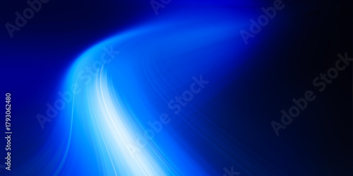Dynamic Blue Light Flow Abstract Background .Modern abstract high speed movement with dynamic motion light trails, speed effect on dark blue background. Futuristic digital technology concept