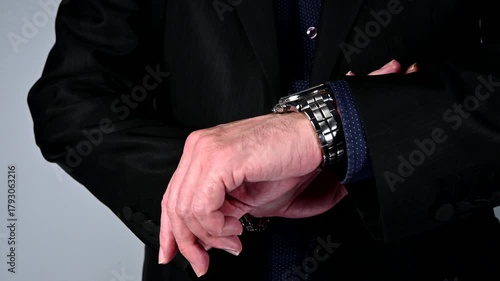 closeup of businessman checking his watch