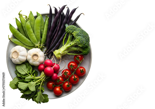 A vibrant assortment of fresh raw vegetables including peas broccoli garlic radishes and tomatoes isolated on transparent background