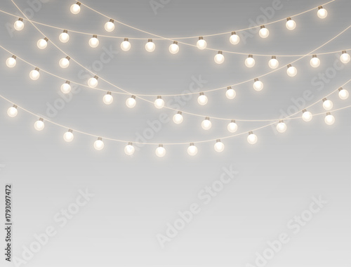 Golden garland shines with festive lights on a bright banner.