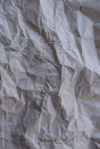 Brown crumpled recycled paper texture background. Kraft Paper