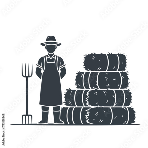 Farmer with pitchfork standing next to stacked hay bales, representing agriculture and harvest