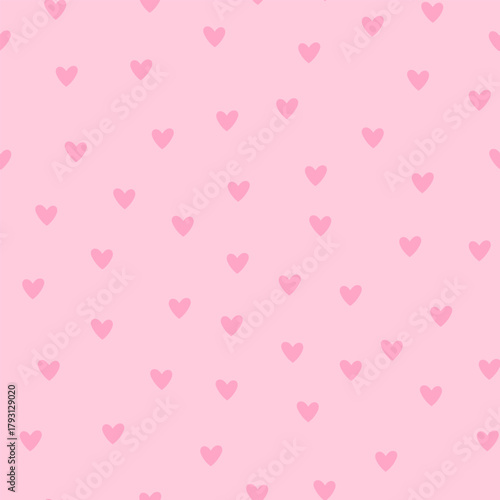 Seamless pattern with gentle small heart on pink background. Ideal for Valentines holiday design, textiles, wrapping