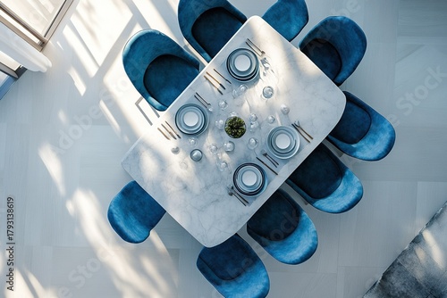 Grey dining room with blue armchairs, top view