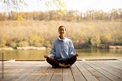 Korean woman practicing med...