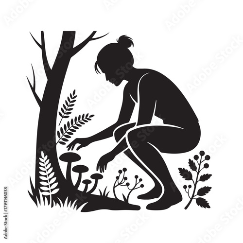 Silhouette of a woman foraging for mushrooms in the forest
