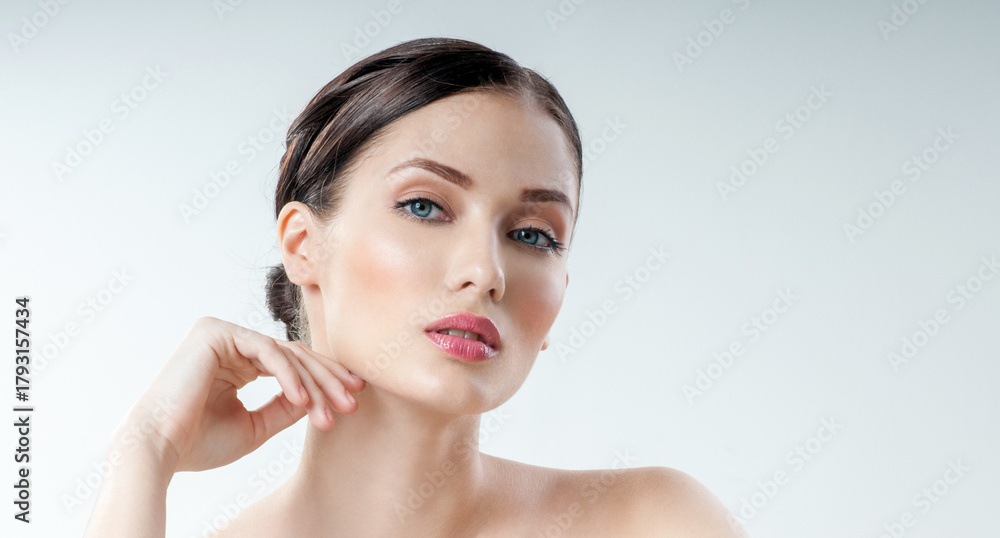 Naklejka premium Beautiful face of young adult woman with clean fresh skin. Perfect skin Cosmetology, beauty and spa .