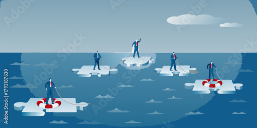Businessmen on puzzle pieces in the ocean helping each other with ropes and life preservers