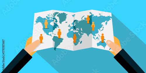 Hands holding a world map with people icons representing global population distribution and connections