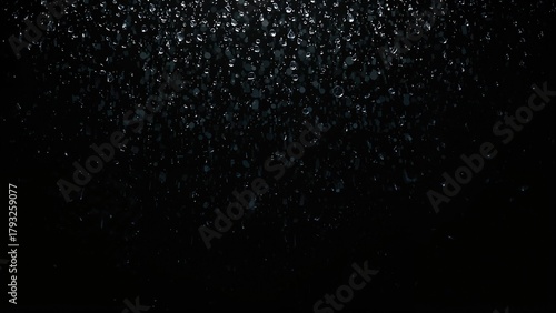 Stars and dust particles in the night sky.
