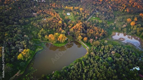 Aerial landscape of the lush green BR Hills near Bangalore, featuring dense forests, rolling hills, and serene water bodies.