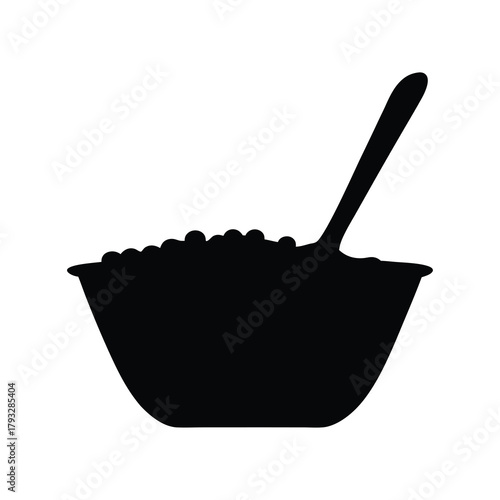 Bowl of breakfast cereal with spoon icon silhouette
