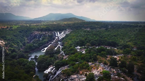 Aerial view of the majestic Shivanasamudra Waterfall, a cluster of cascading falls on the Kaveri River in the Mandya district of Karnataka, India.