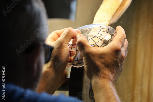 Lead glass grinding - grinder at work