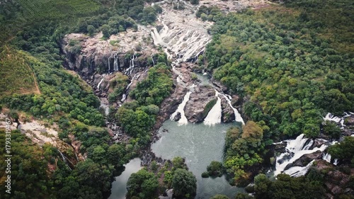 Aerial view of the majestic Shivanasamudra Waterfall, a cluster of cascading falls on the Kaveri River in the Mandya district of Karnataka, India.
