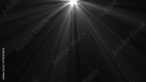 Dramatic light rays emanating from top right corner on black background atmospheric volumetric