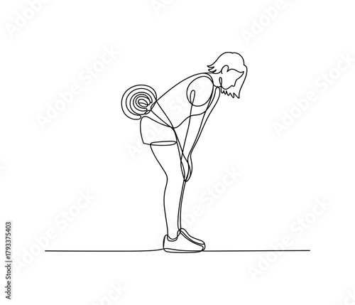 Person bending over with rolled mat on back.