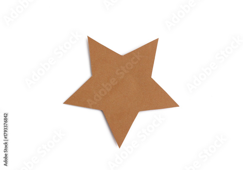 Brown five-pointed star shape cut from cardboard isolated on white background