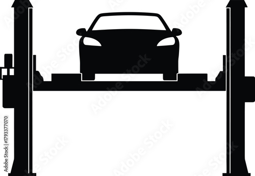 Black silhouette of car on auto lift vehicle garage
