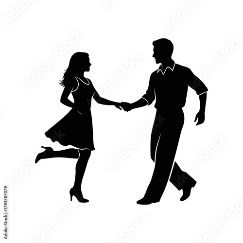 Silhouetted couple dancing holding hands performing a dance step.