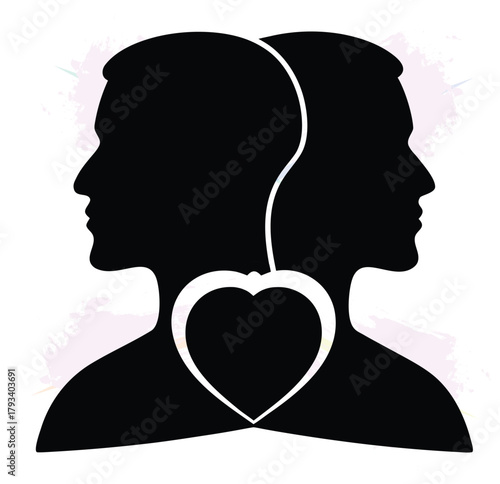 Silhouette of two heads facing opposite directions linked by a heart concept of connection