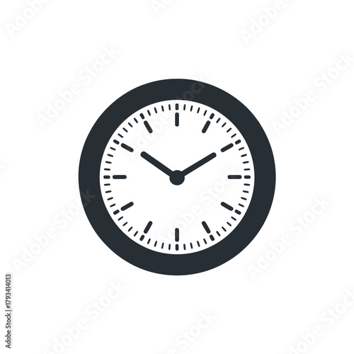 A simple, minimalist wall clock displays the time with its hands pointing to approximately ten past ten.