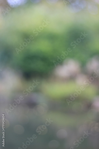 A dreamy blurry view of rain on the river