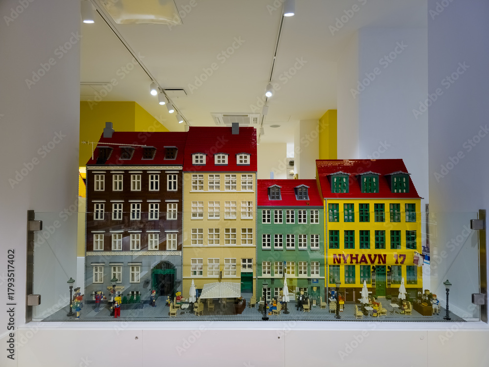 Naklejka premium Copenhagen, Denmark - November 3, 2025: Model of the New Harbour Nyhavn at the showroom of the Lego store