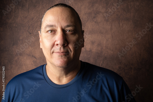 Portrait of a young Brazilian gentleman, portrait of a middle-aged man from Brazil, abstract background, selective focus.