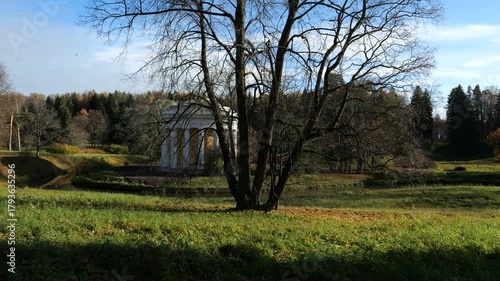 Temple of Friendship Pavilion in landscape Pavlovsk Park on autumn day, suburb of St. Petersburg, Russia