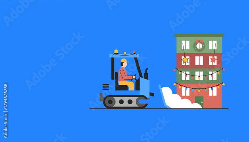 Worker plows snow in front of a Christmas decorated apartment building