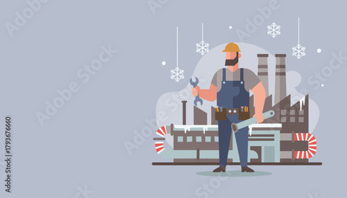 Industrial worker holding tools in front of a factory during cold winter weather