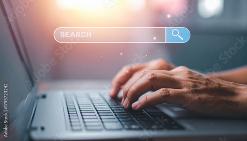 Person hands on laptop keyboard using search bar powered by ai for e commerce. Modern data personalization for finding online information and browsing technology