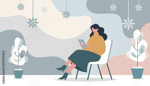 Woman uses a tablet in a cozy modern winter setting with hanging snowflakes