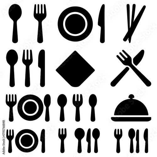 Culinary Elements in Monochrome: An artistic ensemble of monochrome silverware, presenting a clean and organized arrangement of cutlery.